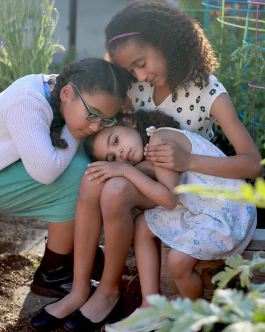 photo of a group of kids hugging